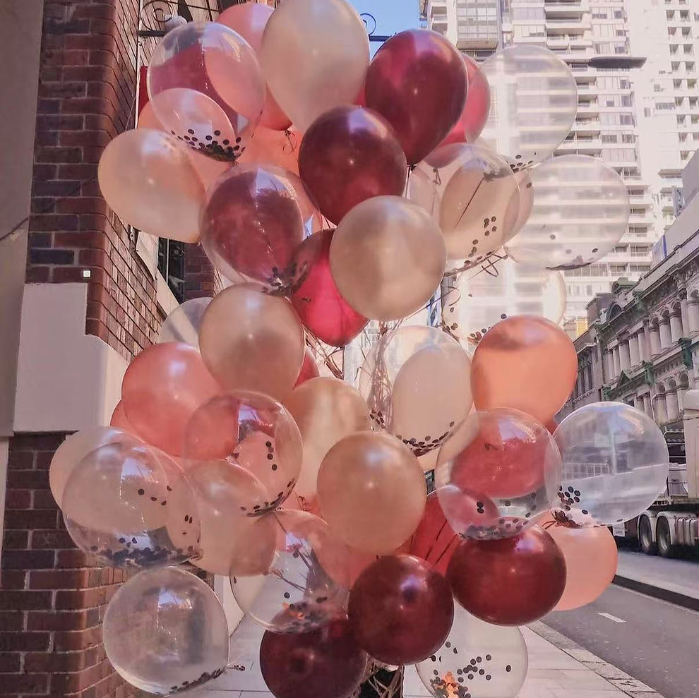 Pink, burgundy and confetti balloons outside the Sydney CBD store